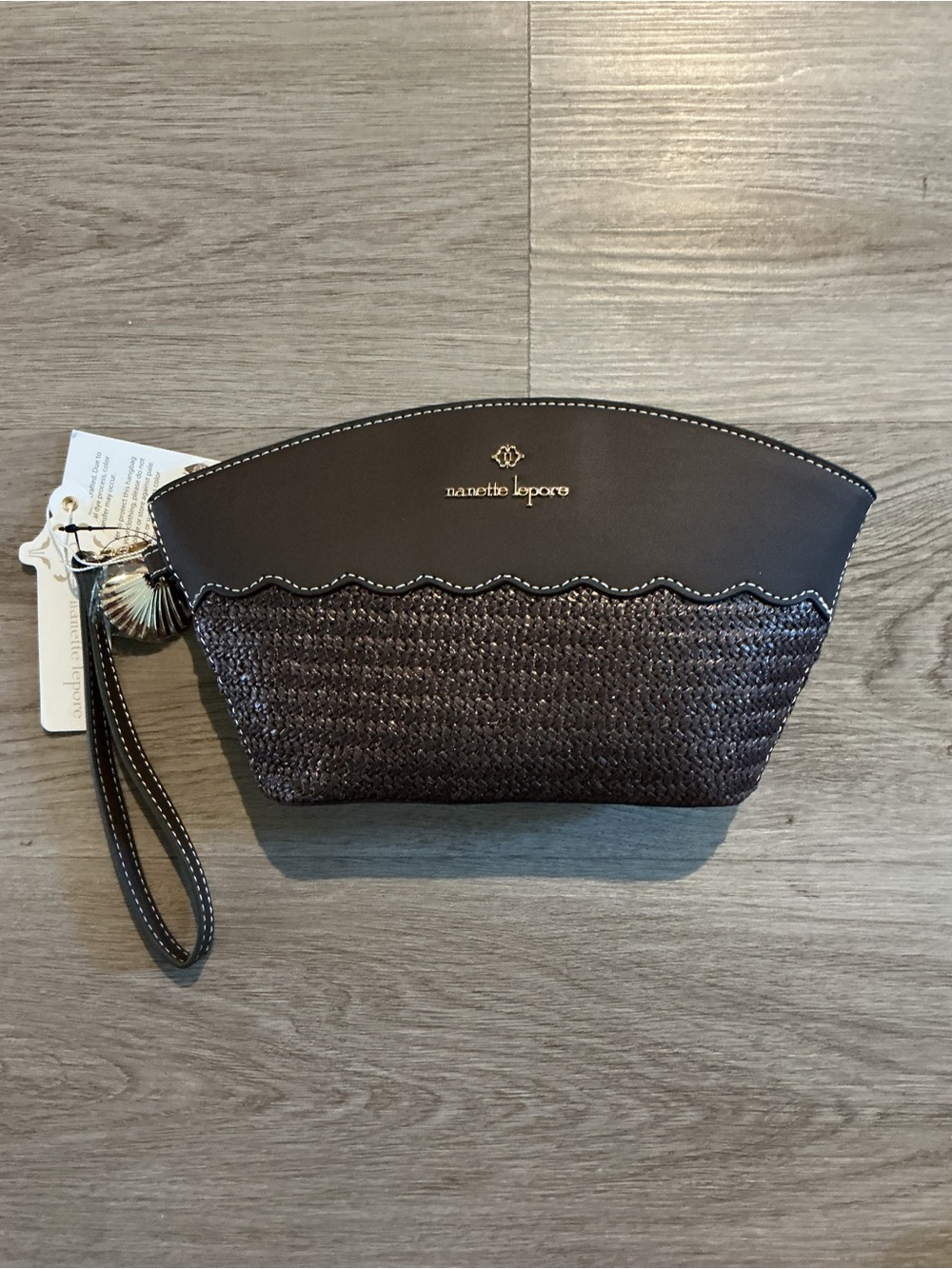 Nanette Lepore dark brown woven wristlet clutch with gold logo